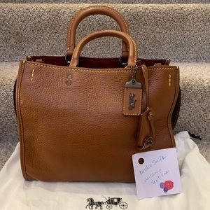 Coach rogue in saddle 2nd gen size 30